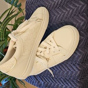 CALVIN KLEIN  cream Signature Sneakers for Women.